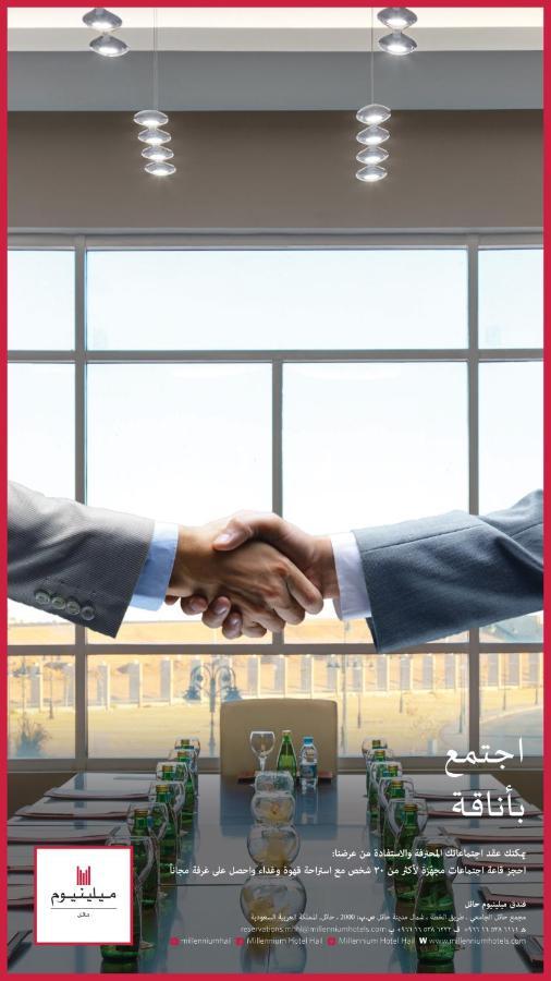 Millennium Hail Hotel Exterior photo The handshake is a common symbol of agreement.